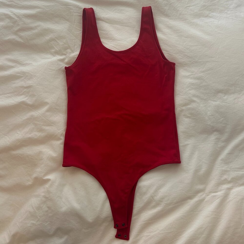Red Twik (Simons) body suit, size M.